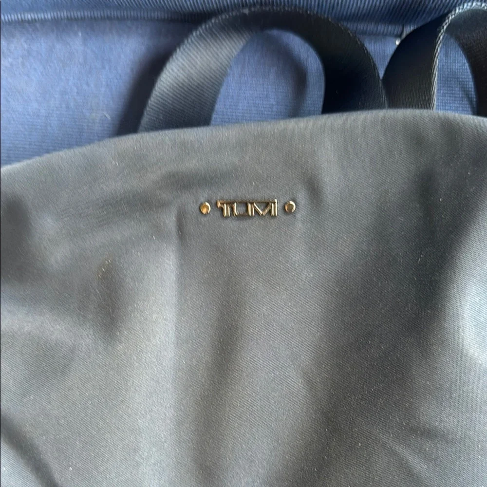 Tumi Black Backpack with Minimalist Design and Durable Material
